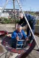 Workmen repairing water feature, Sheffield Hallam University