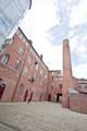 View: c04477 Butcher Works, Arundel Street - interior courtyard showing chimney 