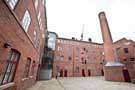 View: c04478 Butcher Works, Arundel Street - interior courtyard showing chimney 