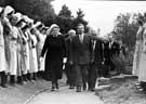 Visit of Health Minister Hilary Marquand to Ranfall Nurses' Home, accompanied by Matron and with nurses lining the path, 12 September 1951 Visit of Health Minister Hilary Marquand to Ranfall Nurses' Home, accompanied by Matron and with nurses lining the path, 12 September 1951