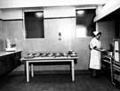Jessop Hospital for Women. Cook preparing meals in the kitchens, 1950