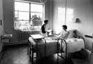 Jessop Hospital for Women. Hospital ward, mother in bed with baby beside her,  1950