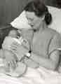 Mother and baby on Maternity ward, City General Hospital (latterly Northern General Hospital), Fir Vale, c. 1950s