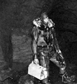 Mr. J. Davis a member of University of Sheffield Mountaineer Club (Pot Hole Section) exploring Peak Cavern at Castleton Mr. J. Davis a member of University of Sheffield Mountaineer Club (Pot Hole Section) exploring Peak Cavern at Castleton