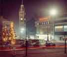 Christmas illuminations in Barkers Pool showing the Gaumont Cinema and the Town Hall taken from Balm Green