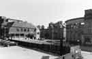 View of the rear of the Memorial Hall on Holly Lane with Barkers Restaurant to the left of the picture and the old City Education offices in the middle View of the rear of the Memorial Hall on Holly Lane with Barkers Restaurant to the left of the picture and the old City Education offices in the middle