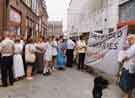 Library workers, with Unison banner, outside The Star and Telegraph offices, York Street on the day they returned to work following the Libraries strike of 1995