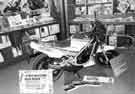 View: s31958 Motorbike display in the Science and Technology Library, Central Library, Surrey Street by Jeff Hall Motorcycles Ltd, as part of Sheffield Festival Week
