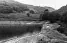Ladybower Reservoir during the drought, revealing the old road bridge 