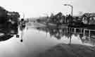 View: s32400 Flooding on Ecclesall Road South at Parkhead, Ecclesall; showing Parkhead Garage on left and C.R.Ainsley, grocers on right