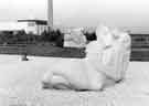 Exhibition of hand carved stone sculptures by Scottish sculptor, Ronald Rae in Nunnery Square alongside the Parkway, with Park Hill flats to the right of the photograph