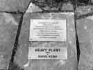 Plaque giving details of David Kemp's artwork 'Heavy Plant' (commissioned by Sheffield City Council's Arts Department) in the Sheffield Science Park, Howard Street