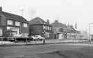 Shops on Ridgeway Road at Gleadless; showing (l. to r.) Audreys hairdressing salon; N.Armstrong, optician and chemist; Harold Brook (News) Ltd; M. Peat Ltd, bakers; Hopkinson's Food Market