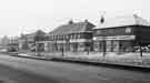 Shops on Ridgeway Road, Gleadless; showing left to right Audreys hairdressing salon; N. Armstrong, optician and chemist; Harold Brook (News) Ltd; M. Peat Ltd., bakers; Hopkinson's Food Market