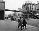 View: s33275 Haymarket footbridge showing John Collier, mens outfitters (right)