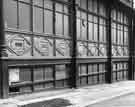 Windows of Newton Chambers Ltd., (Newton House) site, stove grate showrooms, junction of Furnival Street and Moorhead 