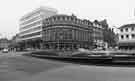 Wilson Peck Ltd., music warehouse, Nos. 66-70, Leopold Street, showing, right, H.L.Brown and Son Ltd, jewellers, Fargate and, foreground, Goodwin Fountain roundabout