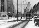Supertram No. 12 on High Street in the snow