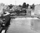 View: s33833 Sheffield Flood of 1958: Broken retaining wall and work's bridge at Little London Road 