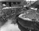 Sheffield Flood of 1958: River debris at John Figorski Ltd, cutlery case makers, and R. Morton and Co. Ltd, cabinet manufacturers, No.100 Little London Road 
