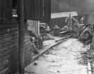 Sheffield Flood of 1958: Damage to wall and property on footpath leading from Saxon Road to Broadfield Road