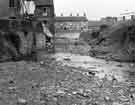 Sheffield Flood of 1958: River Sheaf near Yarborough Road showing river banks and demolished house