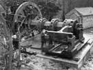 Resiting of the Jessop tilt hammer at Abbeydale Works, former premises of W. Tyzack, Sons and Turner Ltd., manufacturers of files, saws, scythes etc., prior to restoration and becoming Abbeydale Industrial Hamlet Museum 