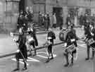 Girls Brigade marching past the Town Hall on Surrey Street showing the Lord Mayor, Alderman Lionel Stephen Edward Farris and the Lady Mayoress, Mrs. Lily Graham