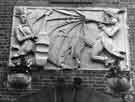 Stone carving relief by Mike Disley over the main entrance to The Leadmill, 6 Leadmill Road