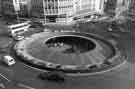 Castle Square (Hole in the Road) roundabout showing C and A Modes Ltd., Nos. 59 - 65 High Street in background
