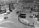 Construction of Sheaf Square roundabout, looking towards Pond Street with Howard Hotel and Sheffield Wholesale Linoleum Company (left) 