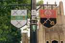 View: s34665 Heraldic banners on lamp posts outside Sheffield Cathedral