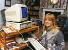 Local children's author, Linda Hoy at her computer
