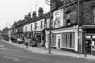 Shops on Asline Road as seen from London Road Shops on Asline Road as seen from London Road