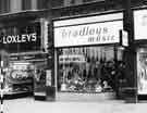 View: s35876 Loxley Brothers Ltd, printers and stationers, No. 57 and Bradleys Music, music and music instruments dealers, No. 59 Fargate