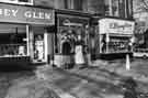 Shops on Ecclesall Road showing (left to right) No. 432 Abbey Glen Laundry Co. Ltd., dry cleaners; No. 430 Charisma, ladies fashions and No.428 C. Broughton Ltd., bakers and grocers Shops on Ecclesall Road showing (left to right) No. 432 Abbey Glen Laundry Co. Ltd., dry cleaners; No. 430 Charisma, ladies fashions and No.428 C. Broughton Ltd., bakers and grocers