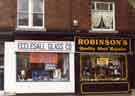 Shops on Ecclesall Road showing Ecclesall Glass Company and No.415 Robinson's, shoe repairers