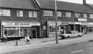 Shops on Green Gate Lane, High Green showing (left to right) Roy Glossop, butchers; D.P. and L.W.Clarke, off licence and grocers and E.and E.Cox, greengrocers