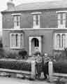 Mr and Mrs Leslie Fox outside No.39 Station Road, Woodhouse