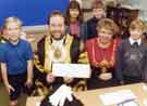 Lord and Lady Mayoress, Ian and Beverley Saunders with a group of children