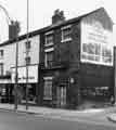 Nos.81-85 London Road showing (left to right) J. Minott, jewellers (No.81) and Sewing Machine Centre, sewing machine agents and dealers (No.83)