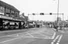 View: s38640 London Road at the junction with Broadfield Road (right) showing (centre) Heeley Railway Bridge and Matthews Quality Furnishings (left)