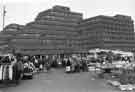 View: s39271 Street market close to the Manpower Service Commission (later the Employment Services Department Training Agency) building, Moorfoot  