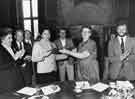 View: s39800 Donetsk [Ukraine, USSR] visitors to Sheffield sign a peace declaration showing (right) Councillor David Blunkett and Councillor Dot Walton JP, Lord Mayor (centre)