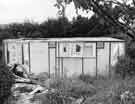 Derelict prefab housing at Totley Derelict prefab housing at Totley