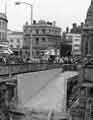 Construction of Subway down to Castle Square (Hole in the Road) at the junction with Haymarket showing (left to right) True-Form, shoe shop (Nos.8-10); Yorkshire Bank (Nos.2-4) 