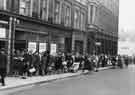 Queue at Housing Department, Mappin Buildings, Norfolk Street showing (right) Brook Shaw Ltd, car dealers (No.195)