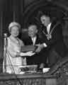 Presentation by the Lord Mayor, Alderman Harold Lambert (right) to the previous Lord Mayor, Alderman Lionel Stephen Edward Farris, JP and Lady Mayoress, Mrs Lily Graham
