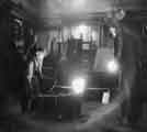 Swift Levick and Sons Ltd., steel manufacturers, Clarence Steel Works, Foley Street showing molten steel running from the ladle into ingot molds c.1960