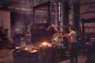 Melting shop at Jonas and Colver Ltd. showing John Shaw, ladleman, making ingots